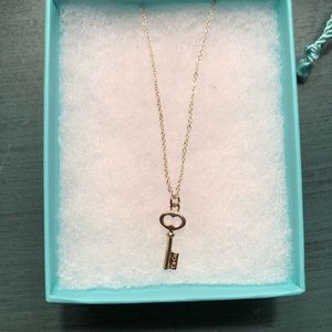 Tiffany & Co mini key pendant. Brand new.
